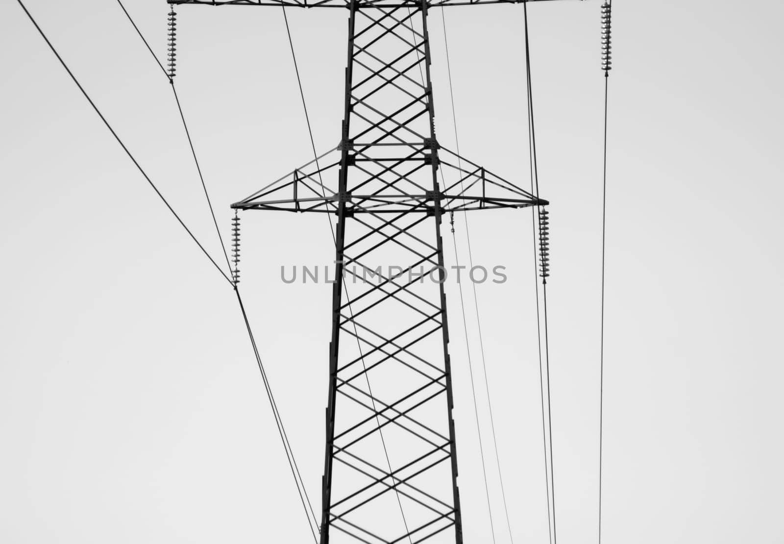 High voltage tower. Power line black and white background