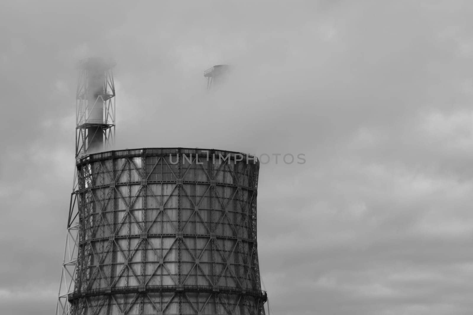 Thermal power plant with smoking chimney. Industrial background