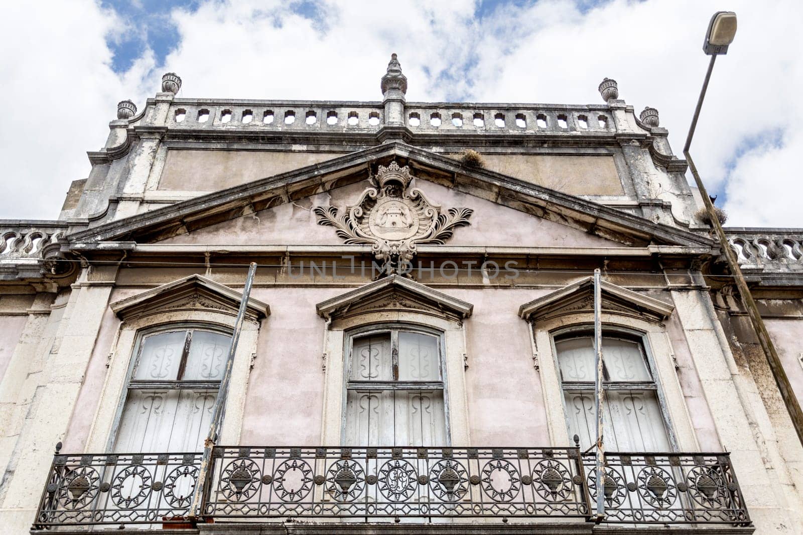 Detail of the monumental facade of the derelict Palace of Condes da Ribeira Grande, built in the early years of the 18th century in Alcantara, Lisbon, Portugal