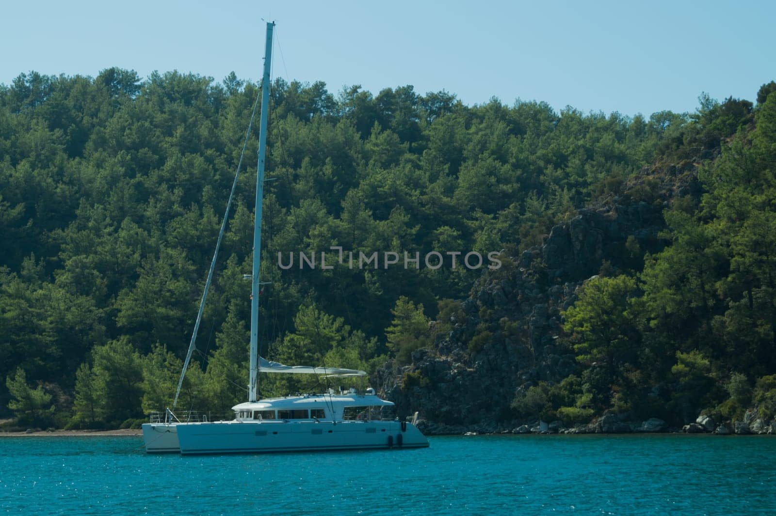 Recreation on the boat near the shore of a mountain