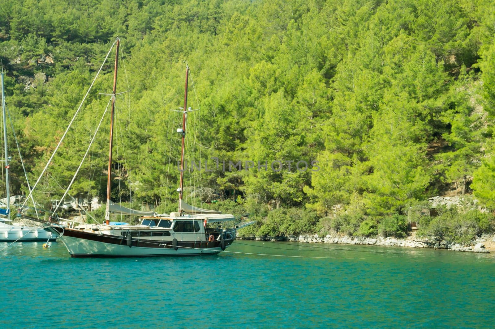 Recreation on the boat near the shore of a mountain