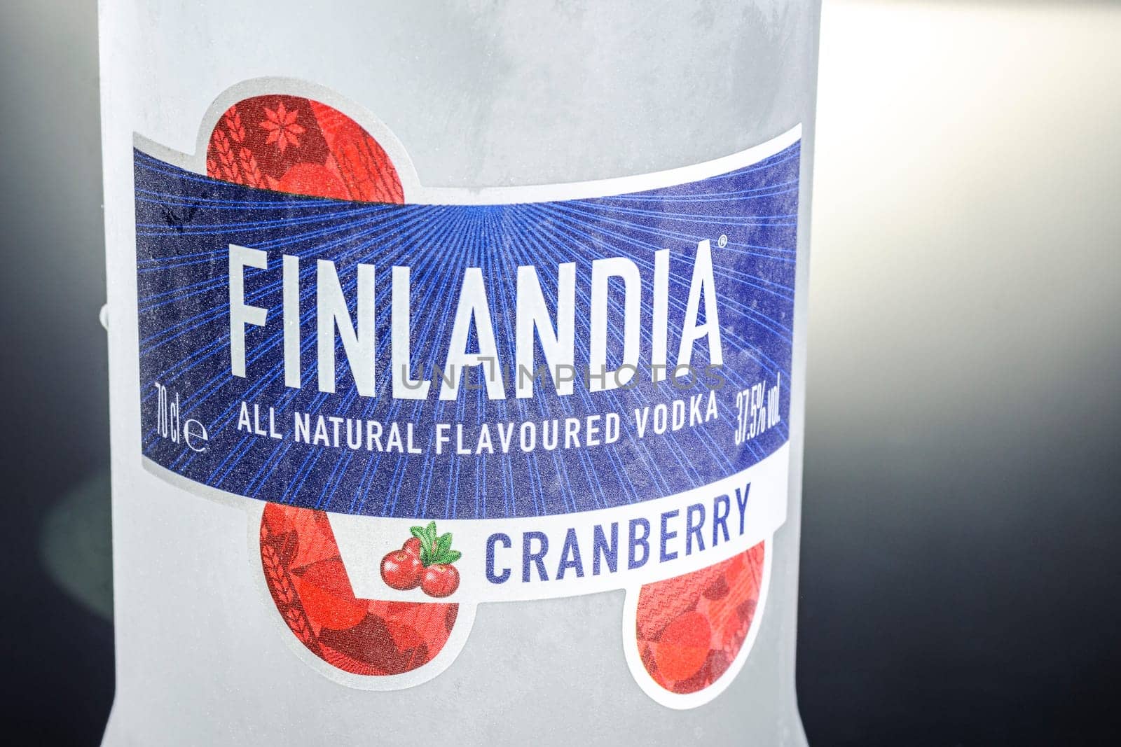 Cranberry flavored Finlandia vodka on gradient background. Finlandia vodka has been produced from barley and pure glacier water since 1970