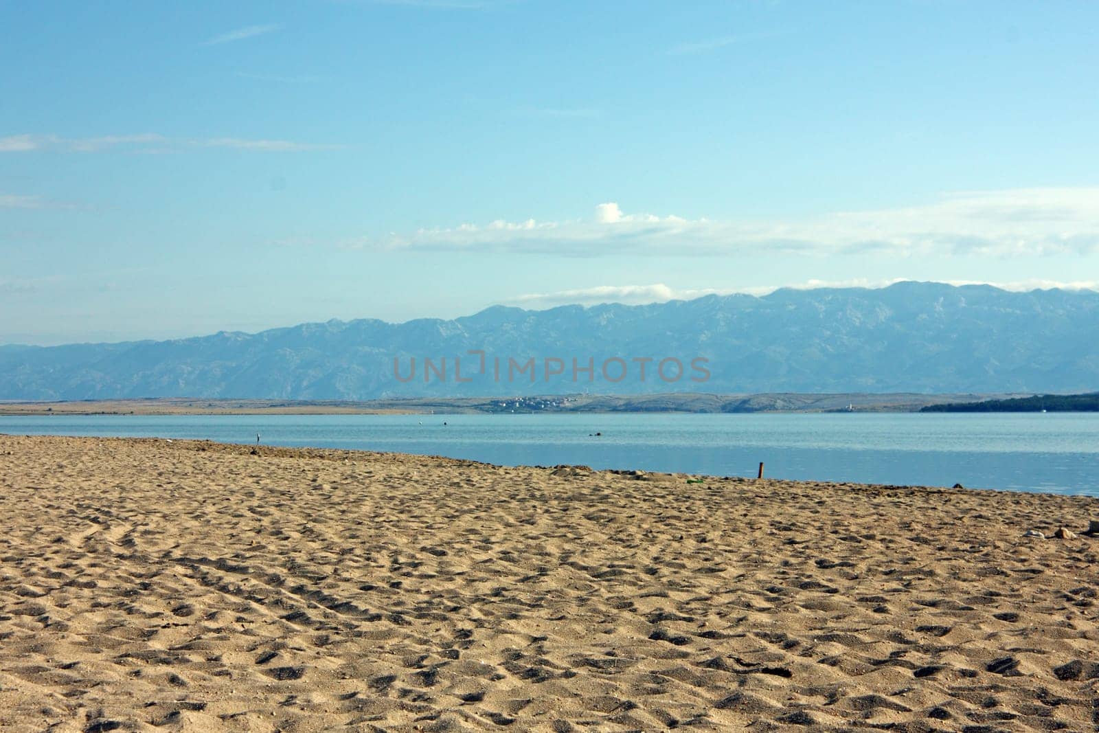 Queen's sand beach in Nin and Velebit mountain, Croatia