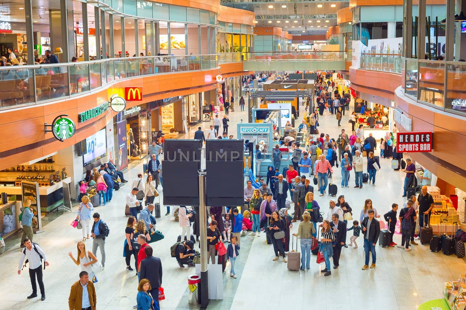 ISTANBUL, TURKEY - MARCH 16, 2017: Interior of Departure hall in Sabiha Gokcen International Airport. More than 32 million tourists visit Turkey a year.