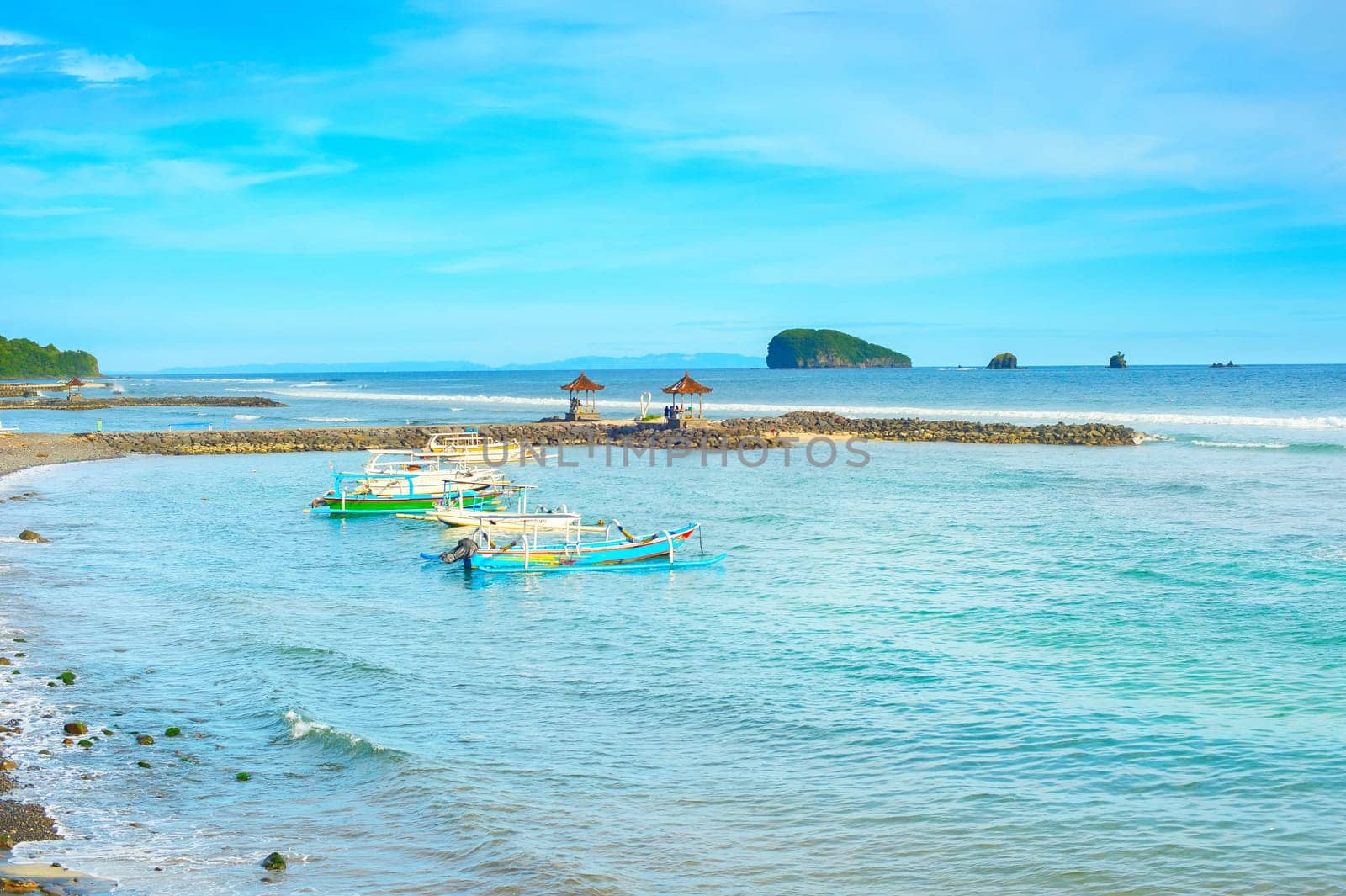 Bali island tropical seascape with traditional boats moored, Indonesia