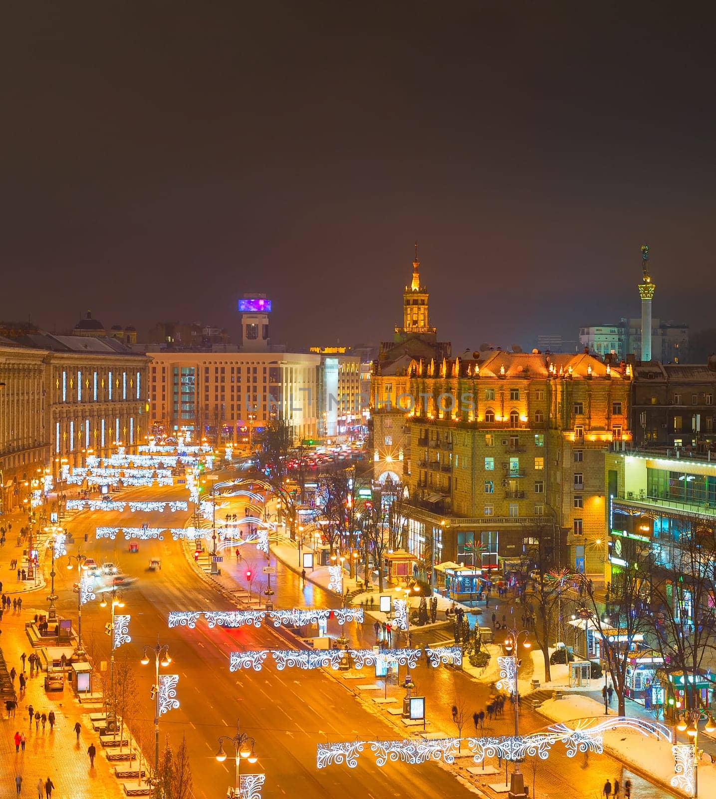 Evening Kiev cityscape with illuminated Khreshatyk street in downtown aerial view, Ukraine
