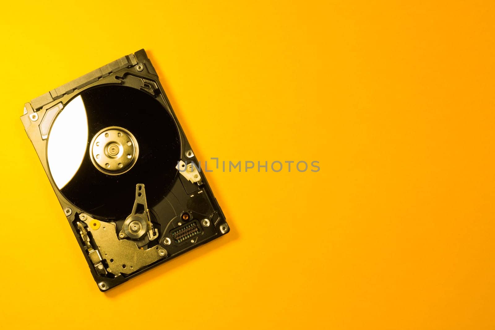 Colorful hdd. open hard disk drive. The concept of data storage. data array. hard drive from the computer. hdd with mirror effect. copy space