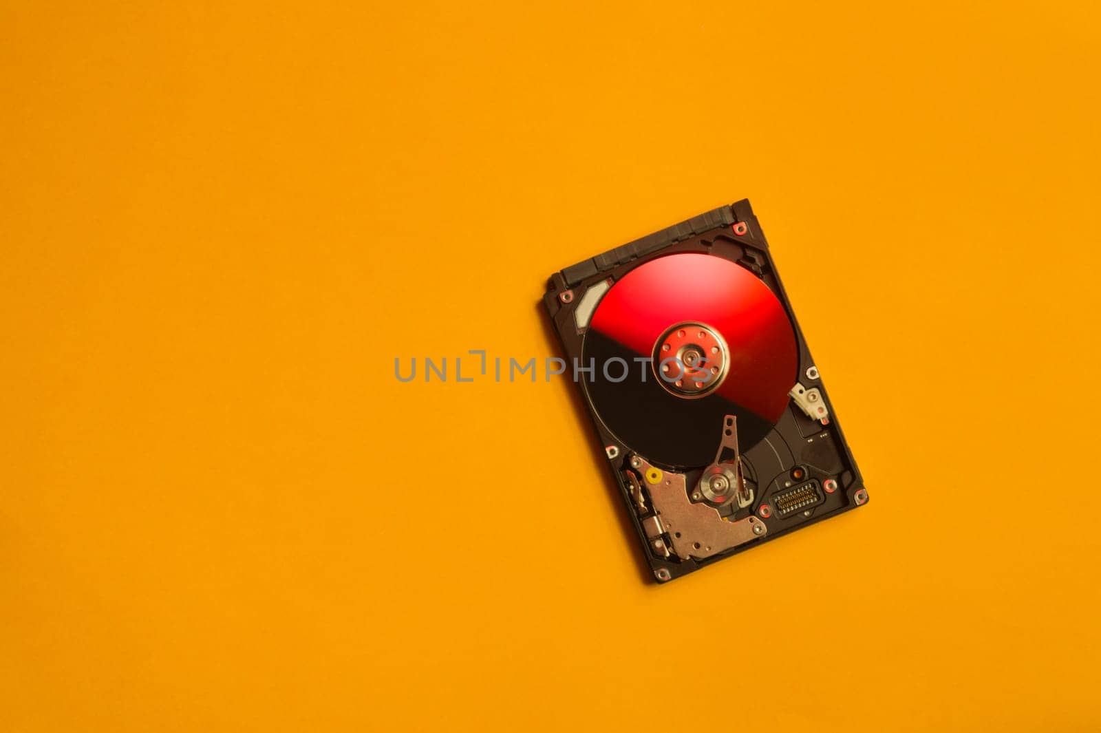 Colorful hdd. open hard disk drive. The concept of data storage. data array. hard drive from the computer. hdd with mirror effect. copy space
