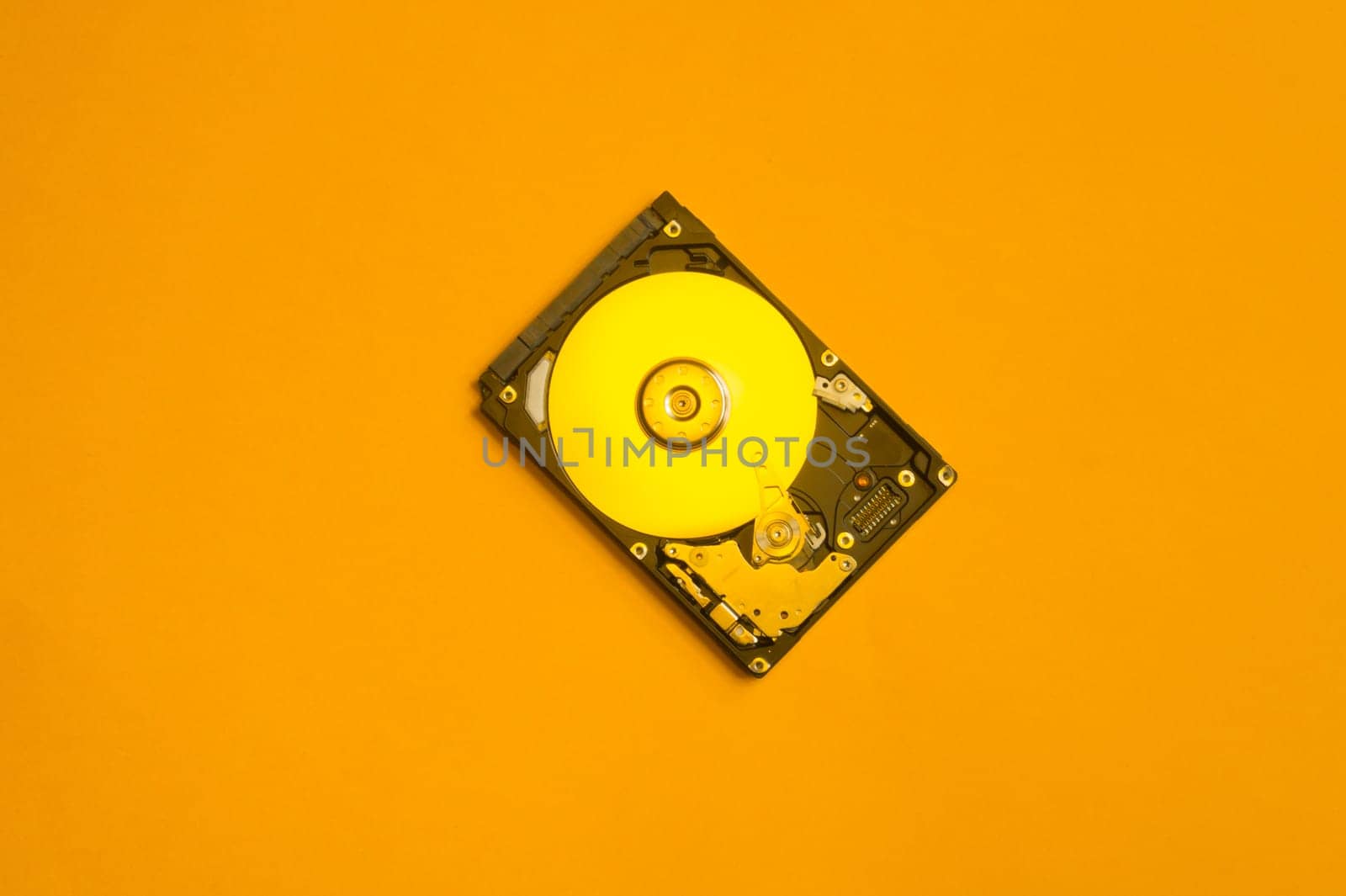 Colorful hdd. open hard disk drive. The concept of data storage. data array. hard drive from the computer. hdd with mirror effect. copy space