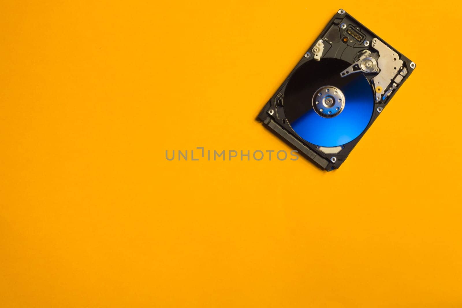 Colorful hdd. open hard disk drive. The concept of data storage. data array. hard drive from the computer. hdd with mirror effect. copy space