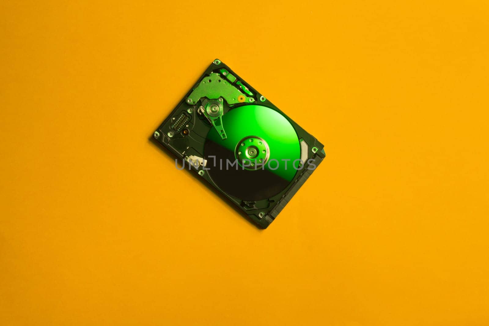 Colorful hdd. open hard disk drive. The concept of data storage. data array. hard drive from the computer. hdd with mirror effect. copy space