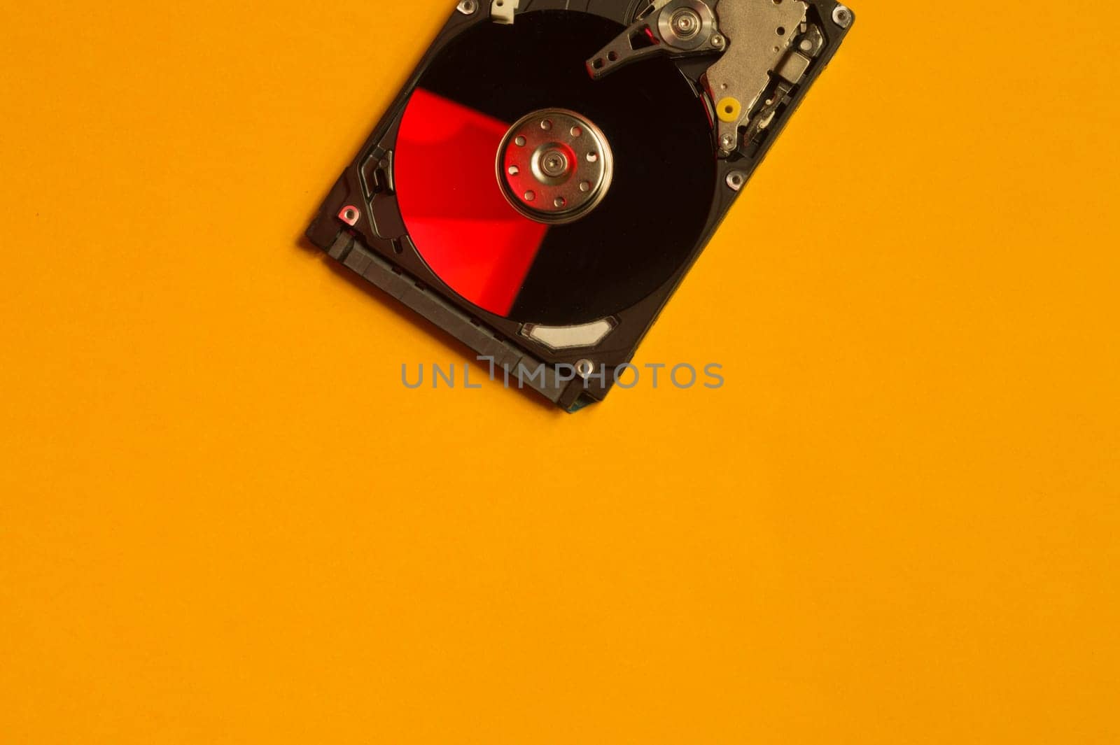 Colorful hdd. open hard disk drive. The concept of data storage. data array. hard drive from the computer. hdd with mirror effect. copy space
