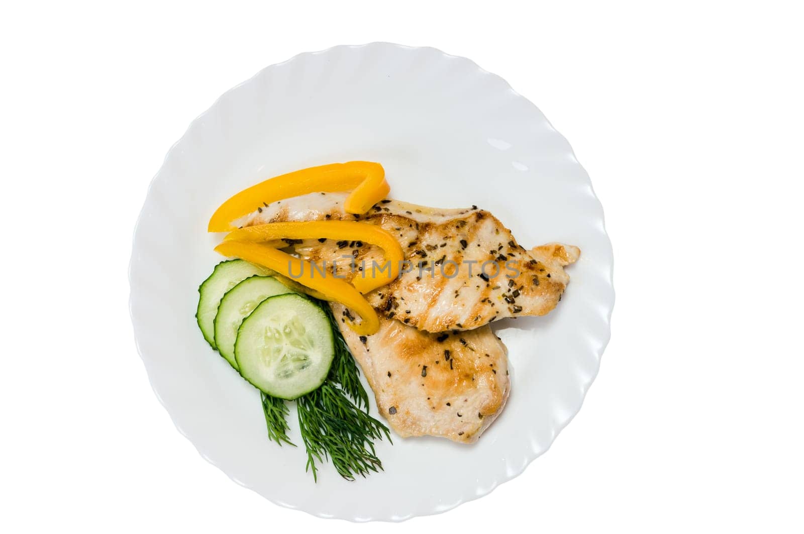 grilled chicken fillet on a white plate isolated white background