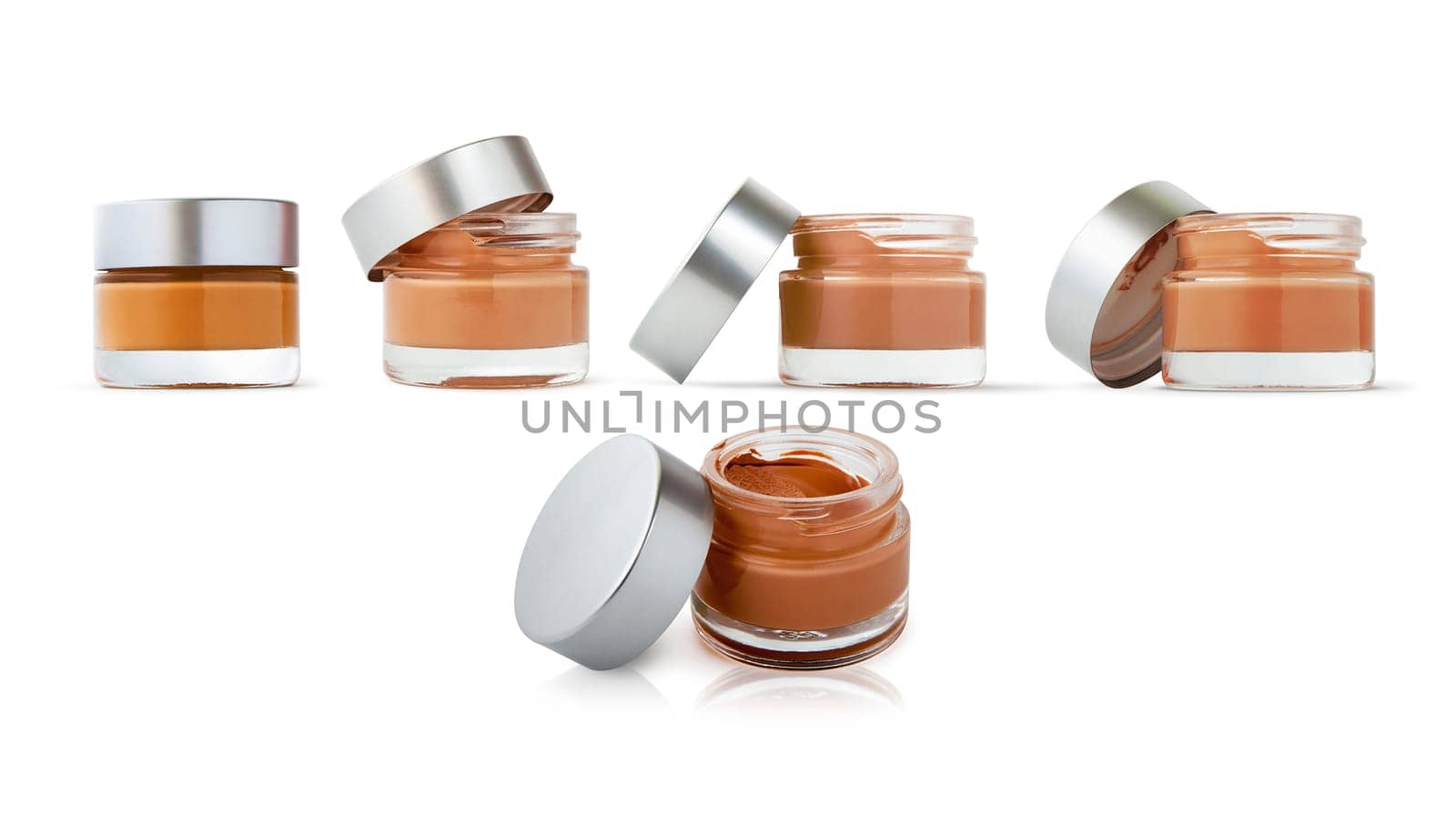 Pink cosmetic cream bottle, spray opened isolated on white background