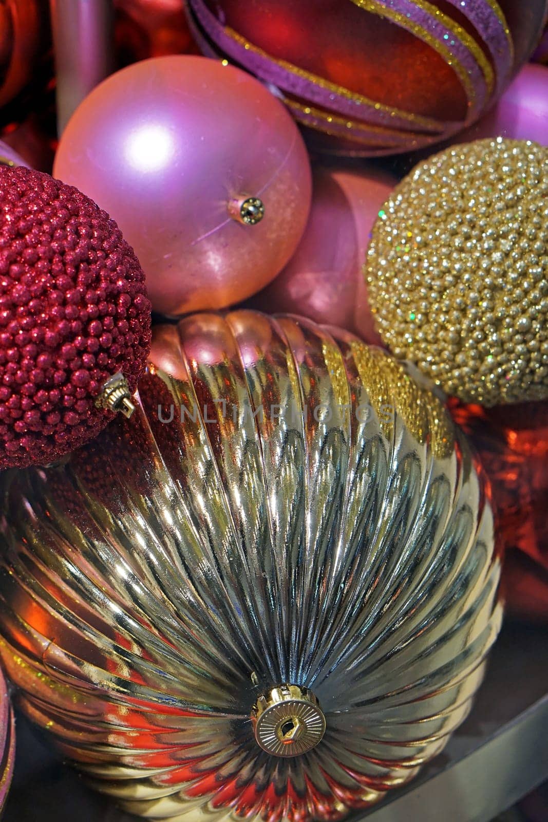Various gold and pink Christmas baubles decoration