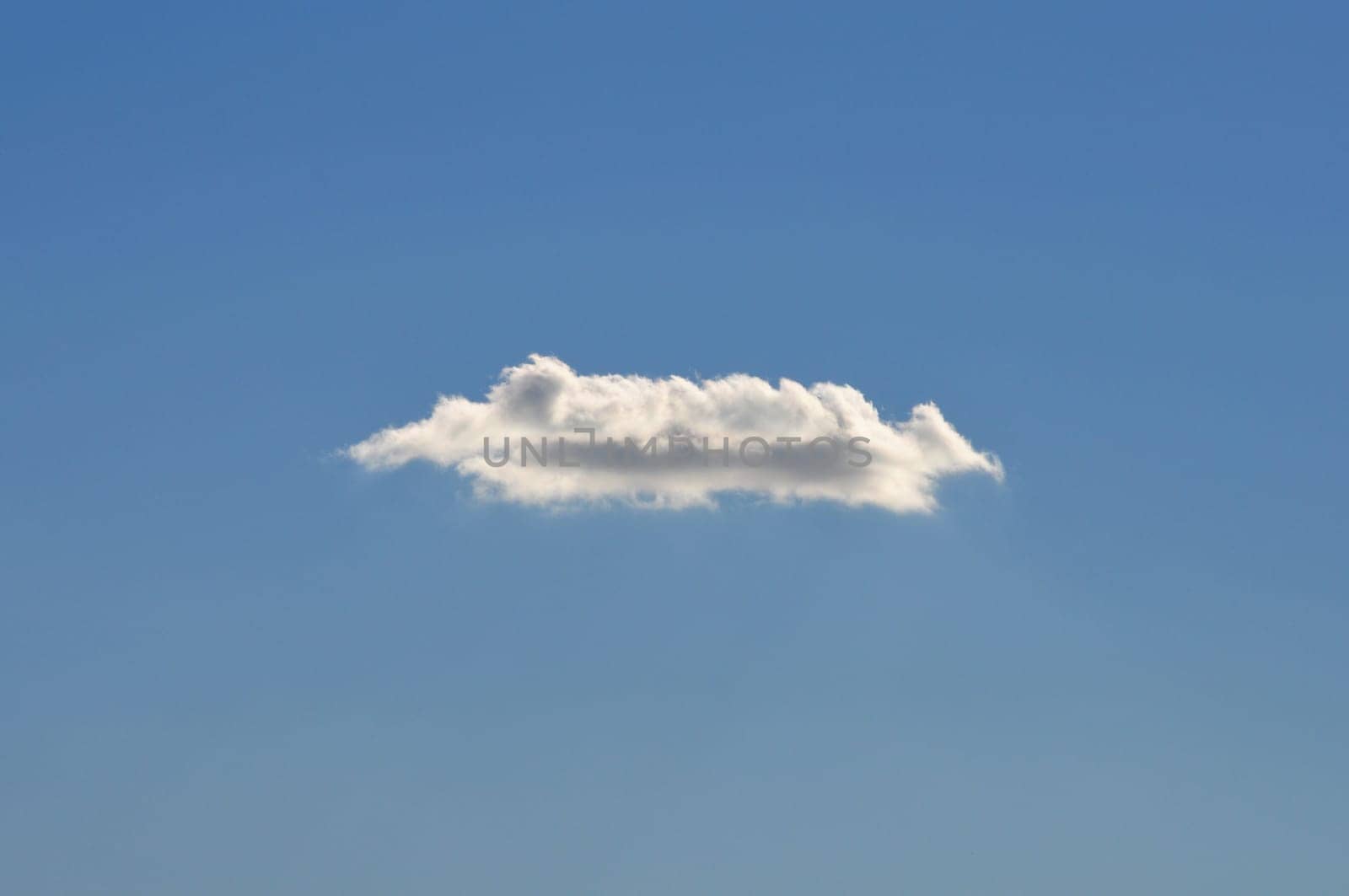 Clear blue sky and white cloud on a sunny day. Nice weather.