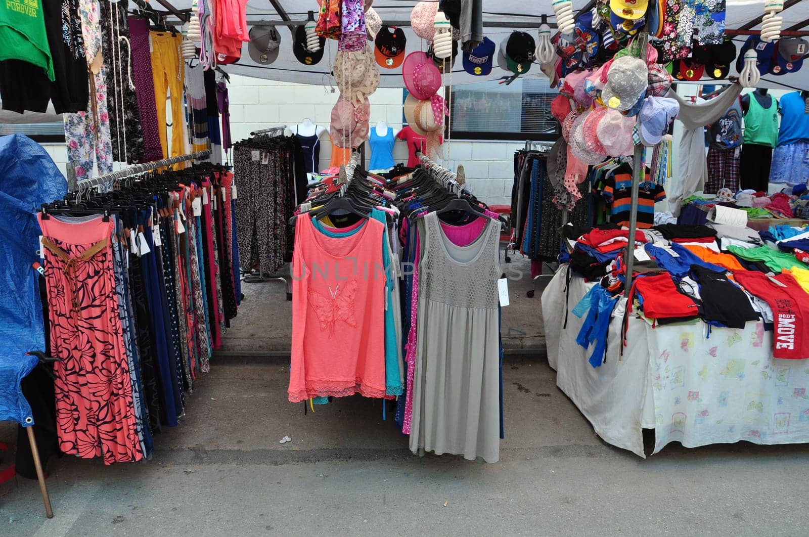 ATHENS, GREECE - AUGUST 15, 2014: Casual summer clothes and accessories for sale at street market.