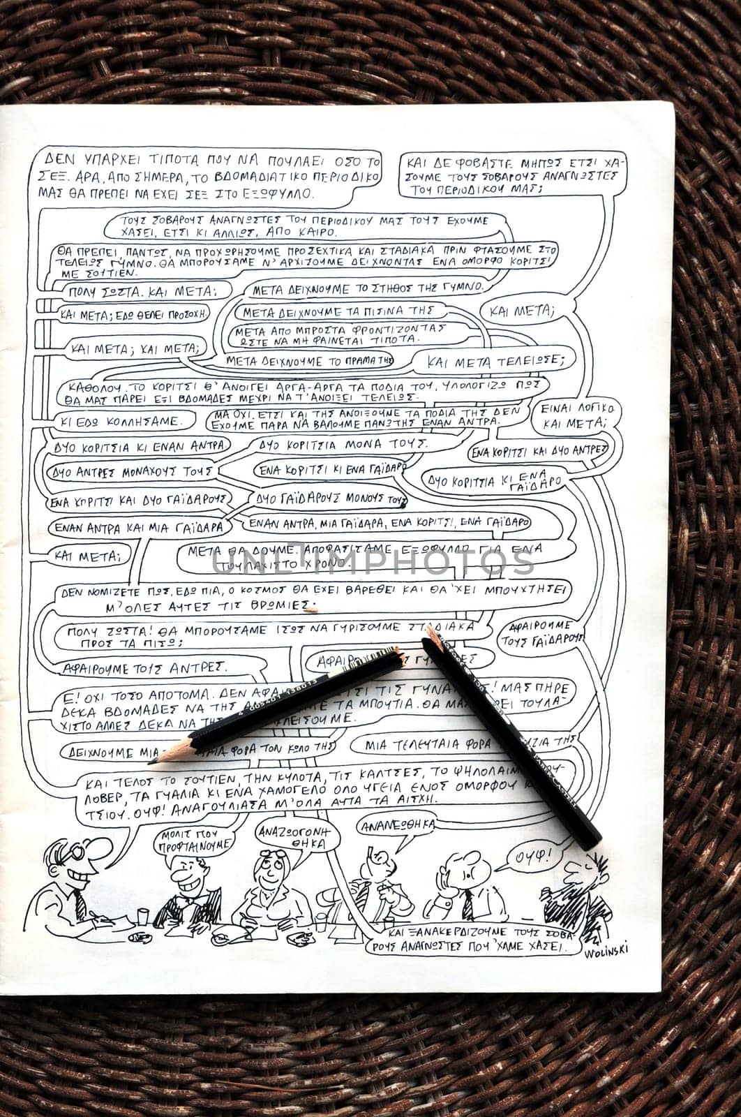 ATHENS, GREECE - JANUARY 8, 2015: Broken pencil on comic book by cartoonist and writer Georges Wolinski (1934 - 2015) one of the victims of the terrorist attack at Charlie Hebdo newspaper on January 7, 2015 in Paris, France.