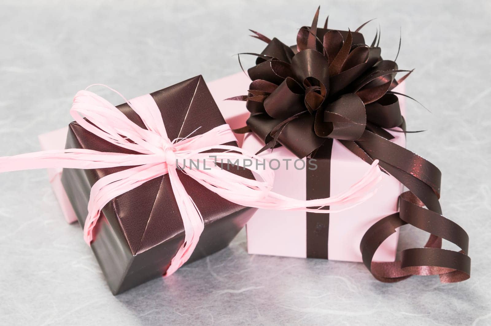 gift pink and brown box with ribbons and bow