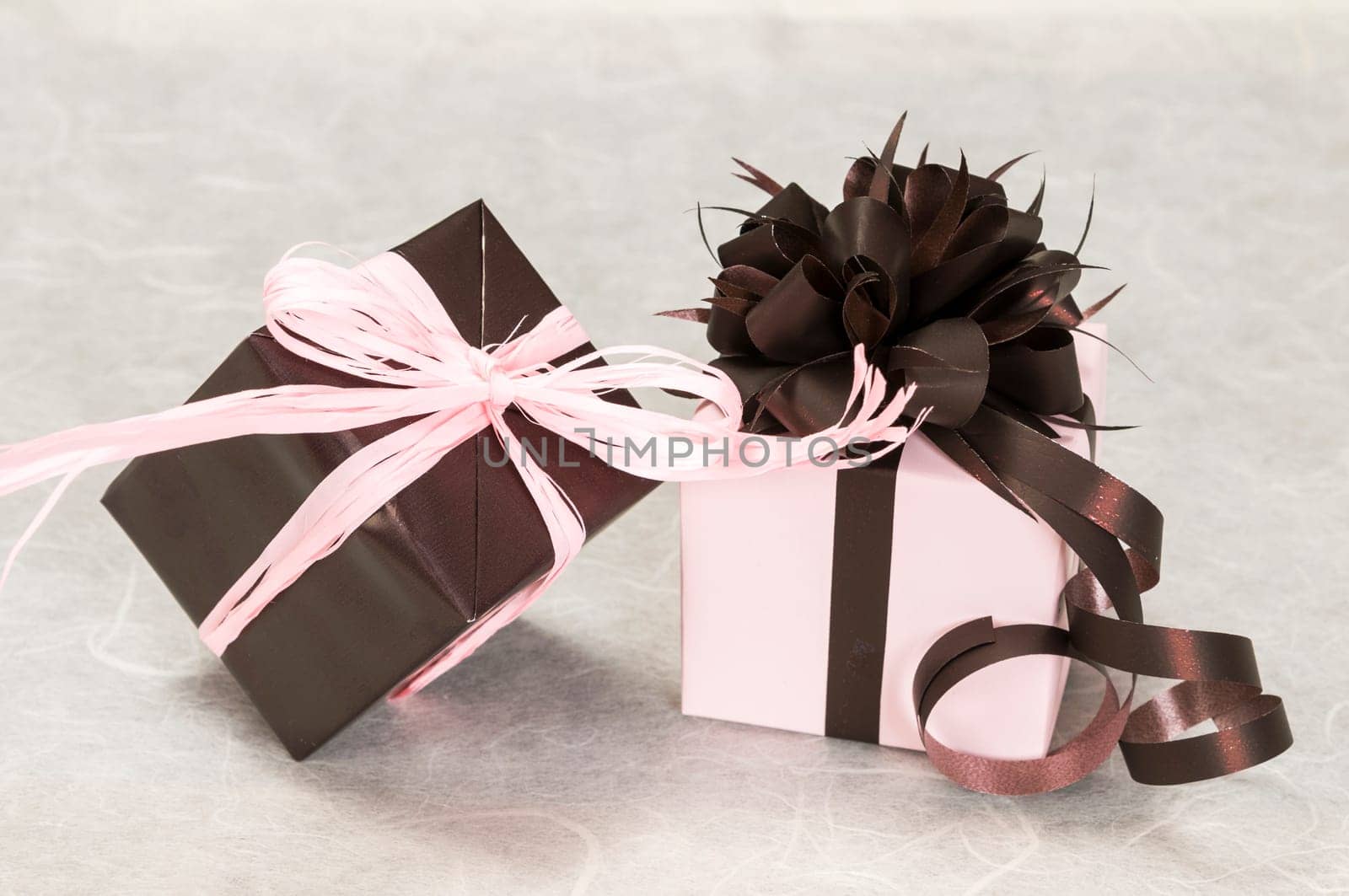 gift pink and brown box with ribbons and bow