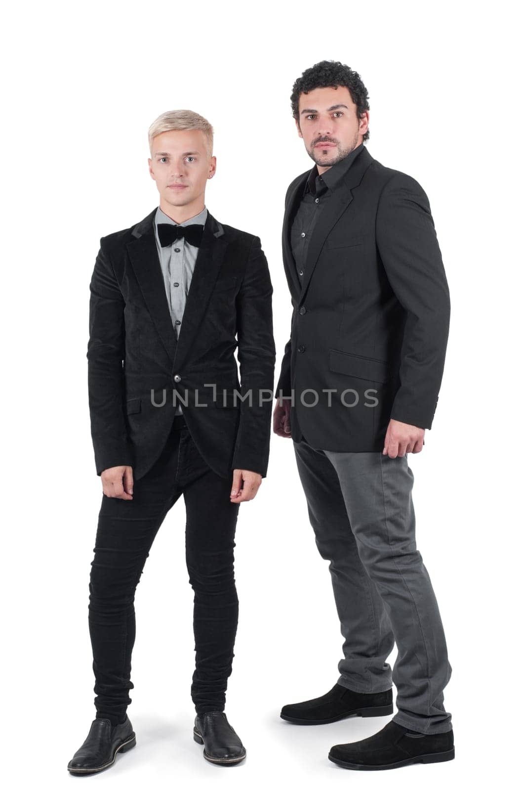 Two young men in jackets isolated on white