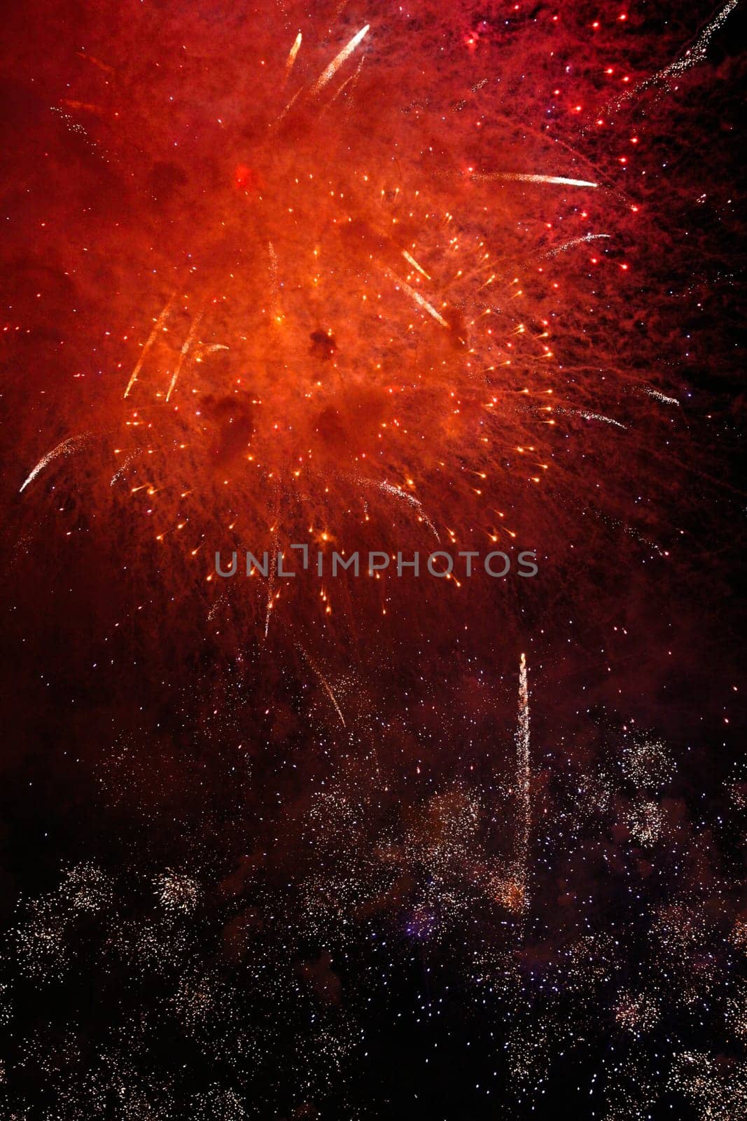 Red fireworks dark background