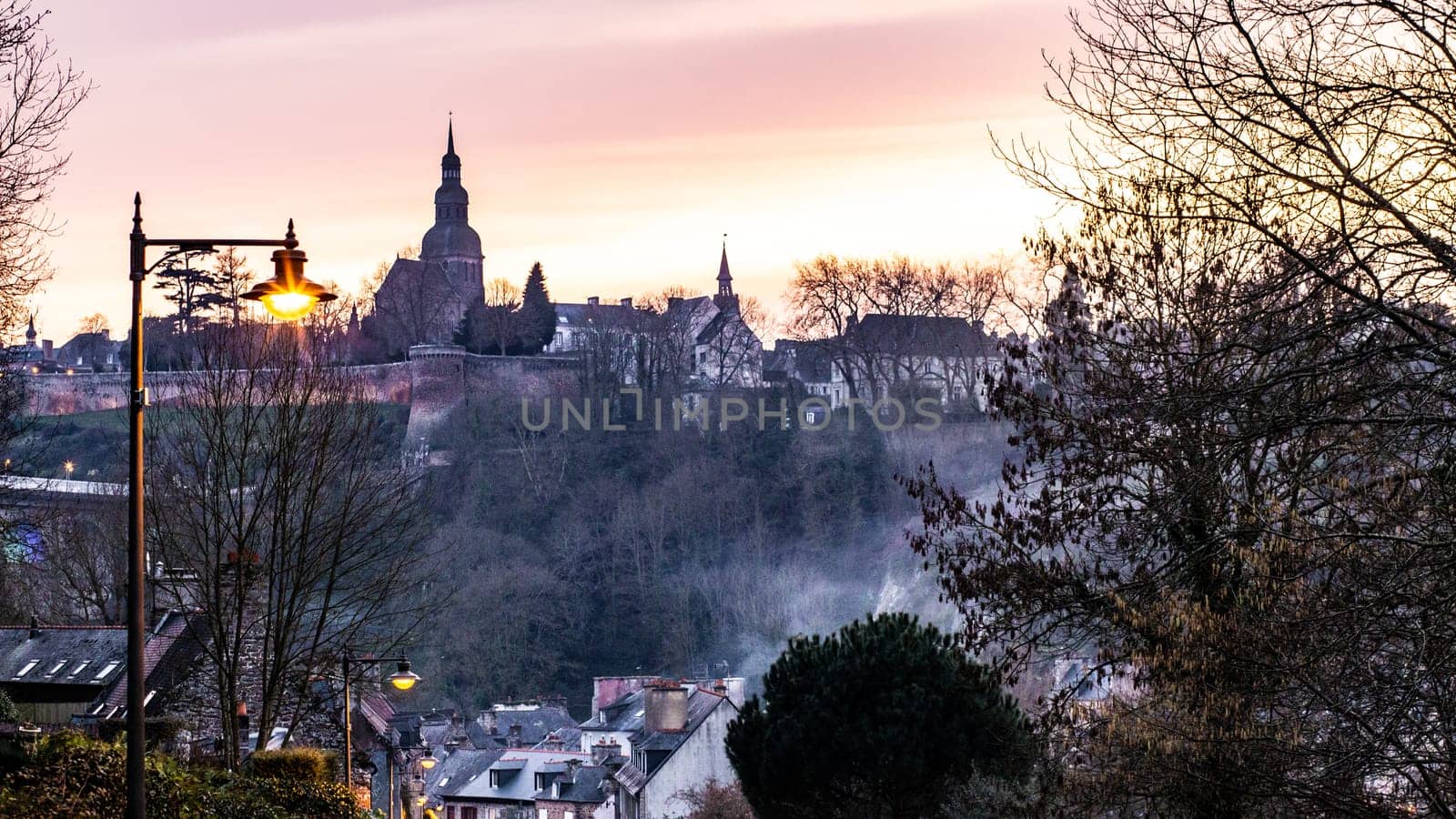 Twilight view of the city of Dinan and its ramparts, Brittany, France