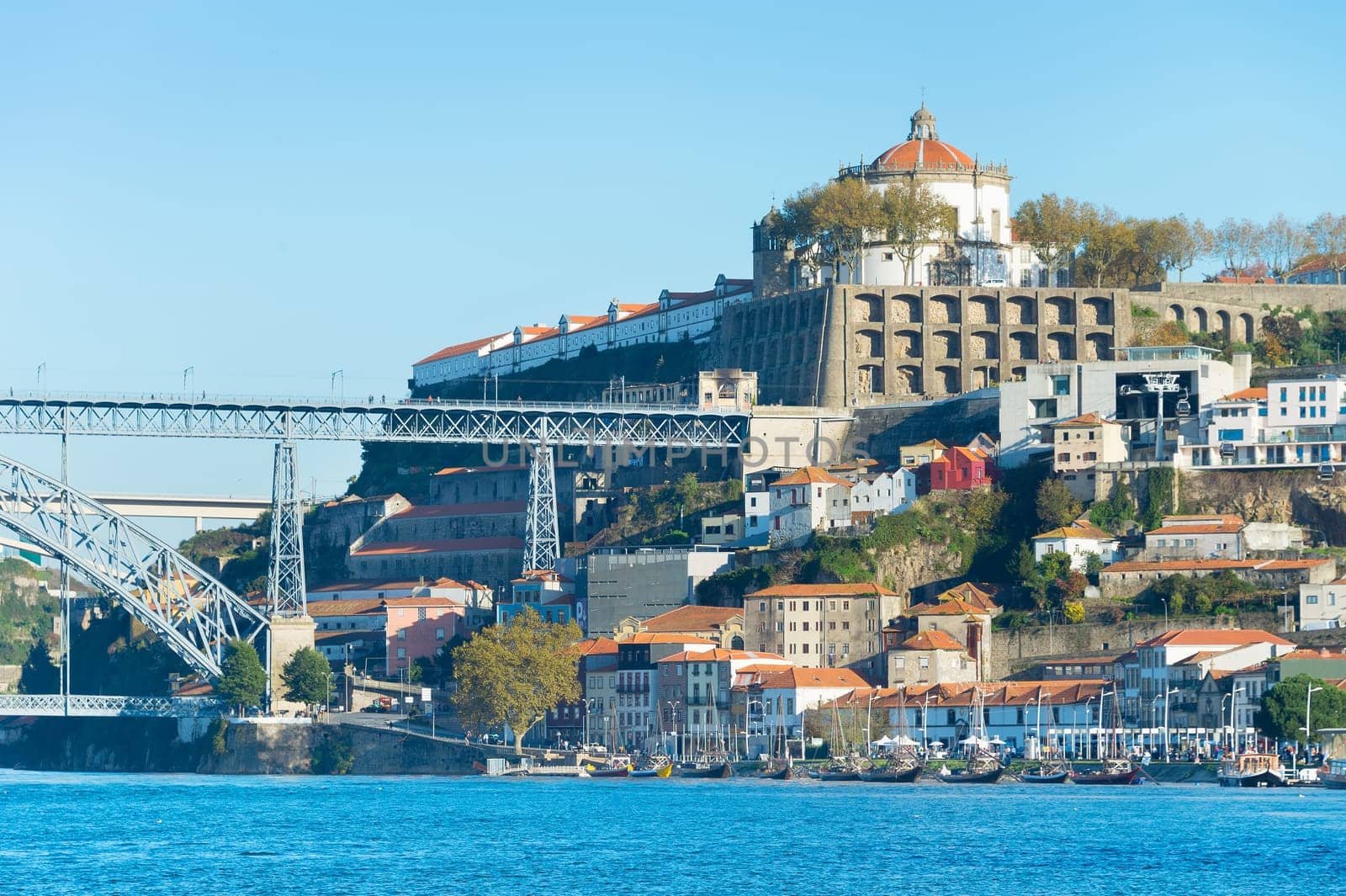 View of old downtown, city Castle and famous Dom Luiz Bridge, Porto, Portugal