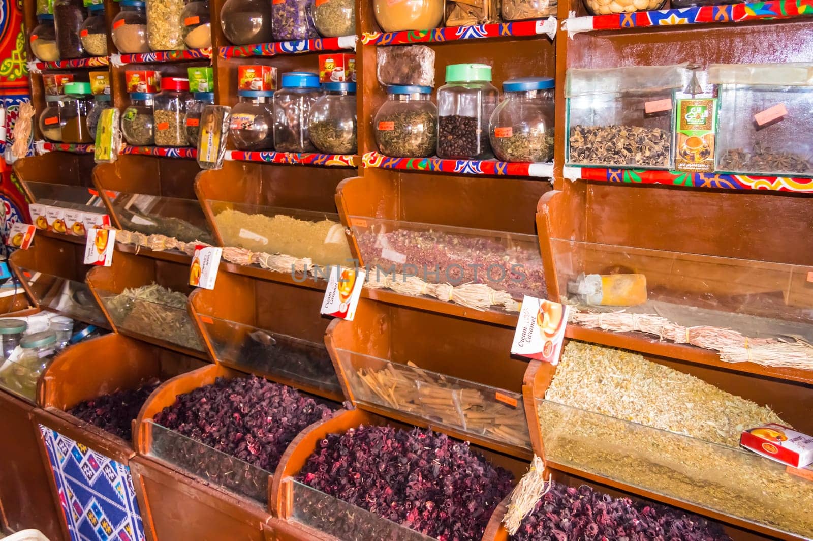 EGYPT, HURGHADA - 01 Avril 2019:Shelf of jars with various spices in a store of the city of Hurghada in Egypt