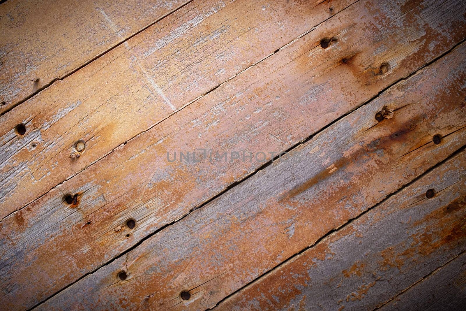 Rustic brown wood planks background with vignetting effect