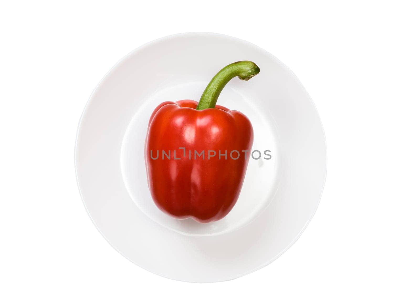 single red bell pepper on white plate isolated on white background