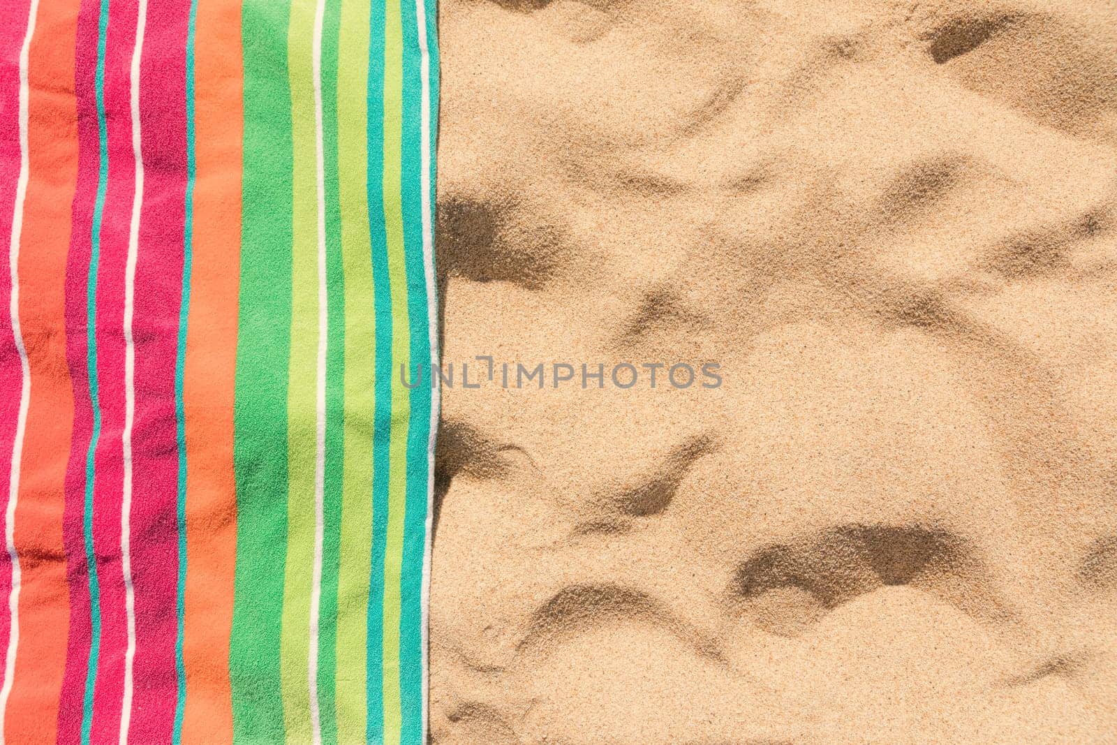 Beach towel on sandy tropical beach