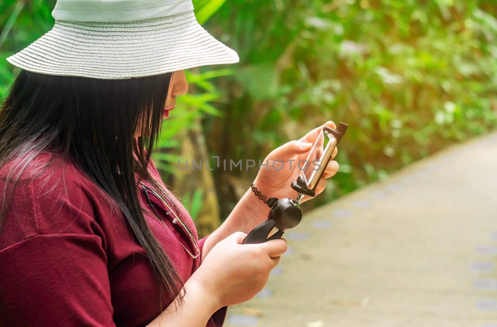 Social network and photography concept, Women with smart phone mobile on blurred background