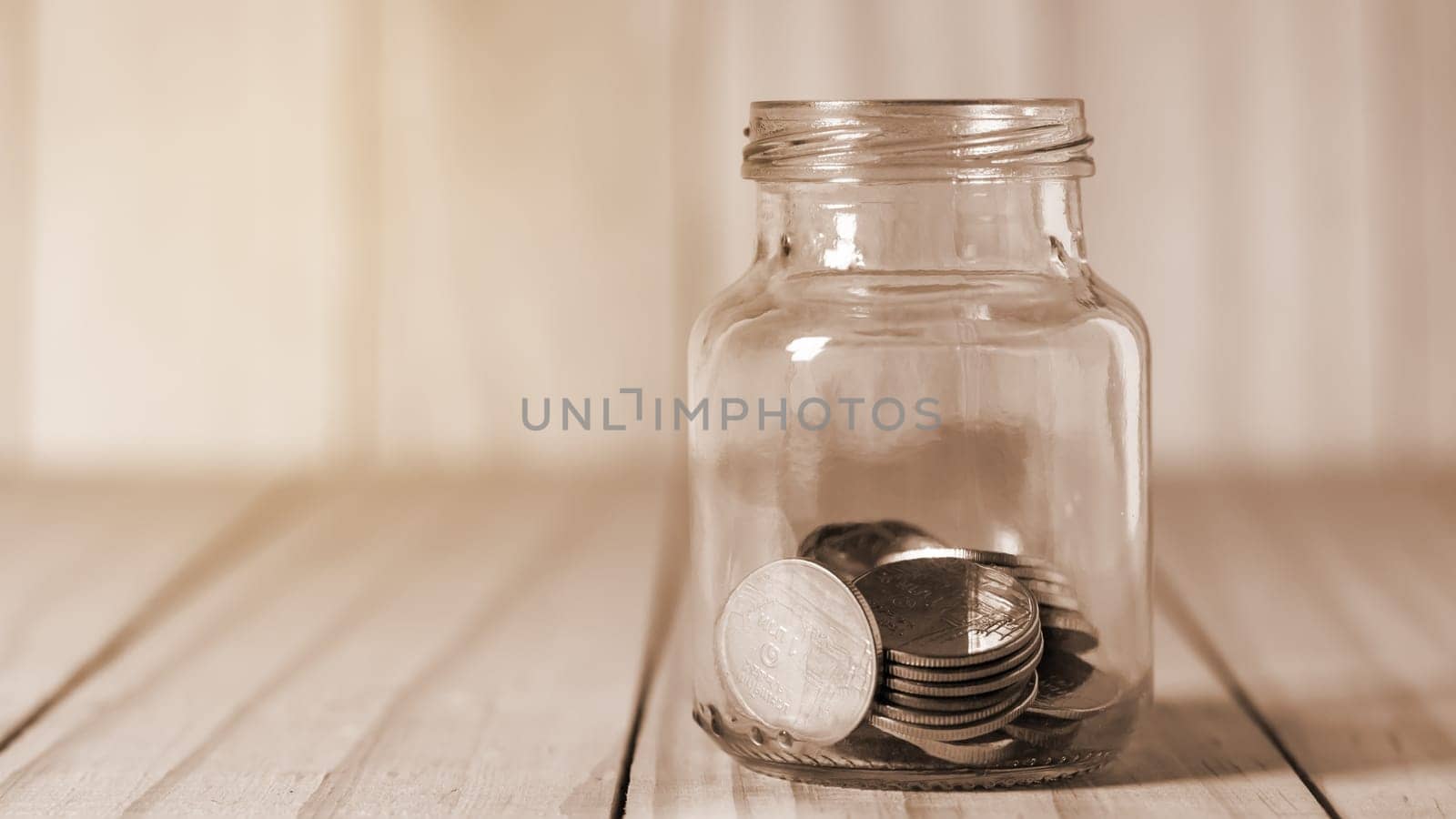 Save money and account banking for finance business concept, Coin in bottle on blurred background