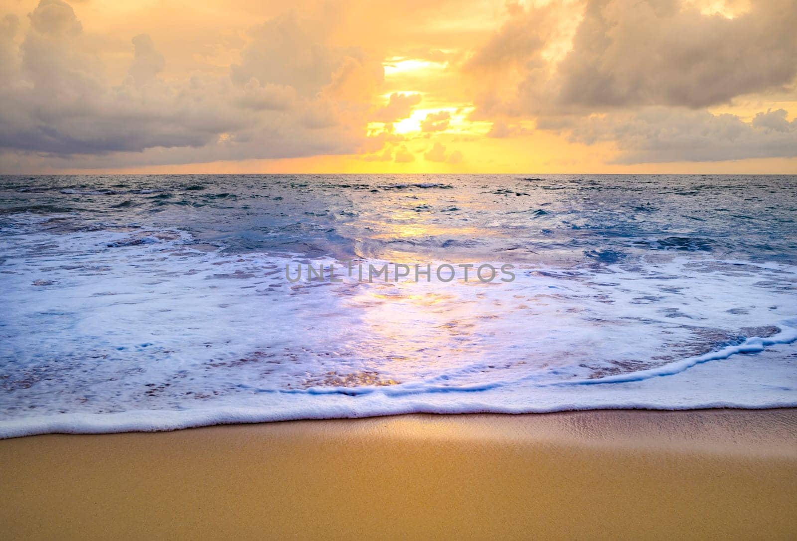Beach sunset or sunrise with colorful of cloud sky and sunlight in twilight
