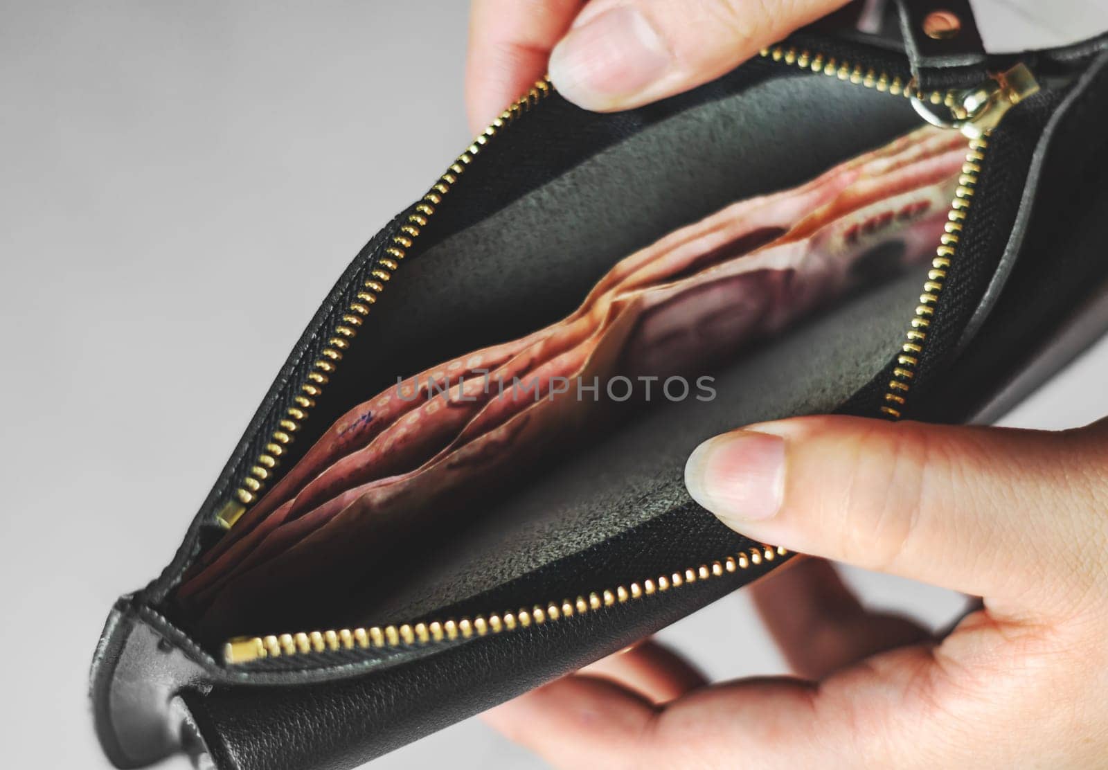 Save money and account banking for finance business concept, Currency money in black bag, Savings for retirement and investing concept