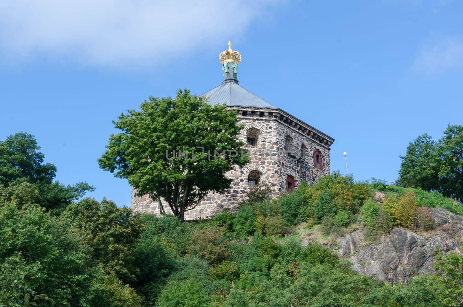 a very old castle on the top of the hill