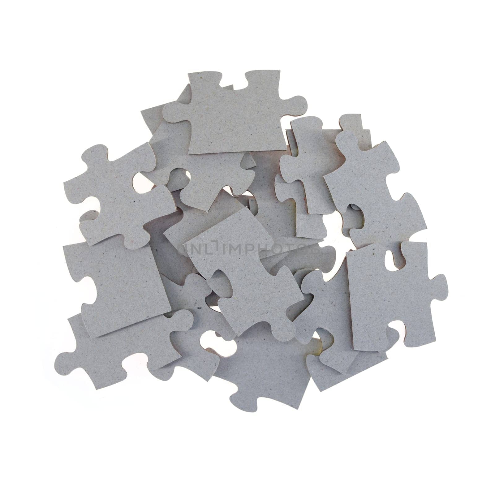 A close up shot of jigsaw pieces