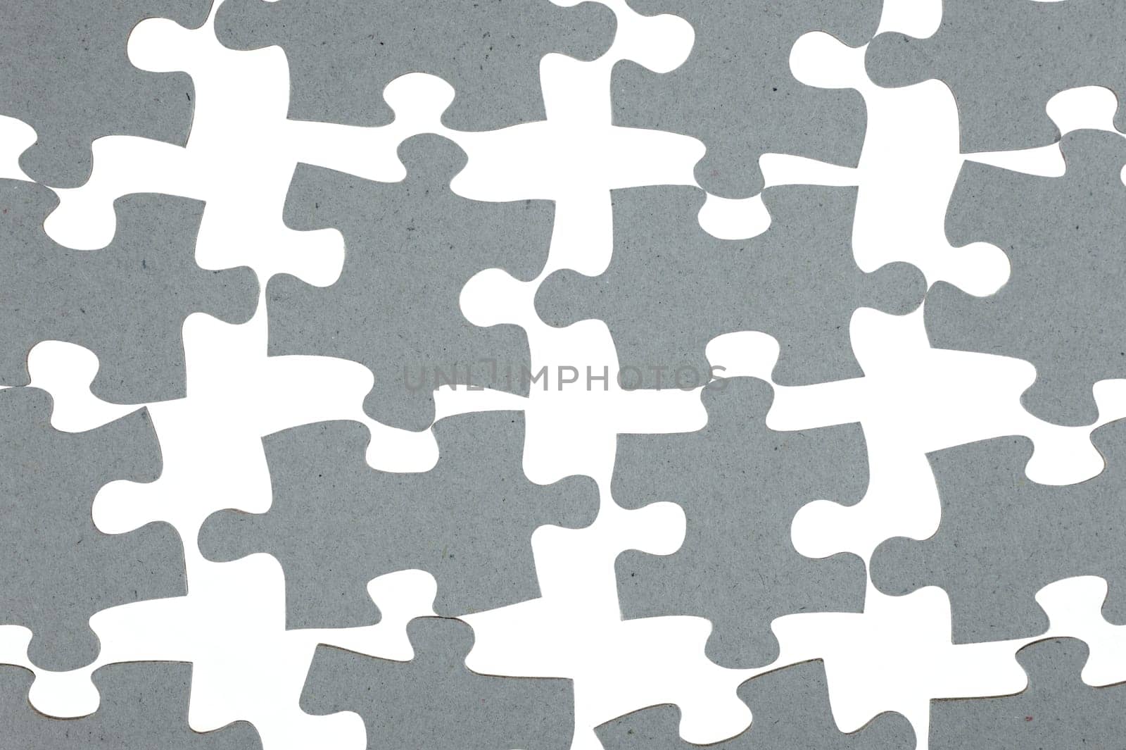 A close up shot of jigsaw pieces