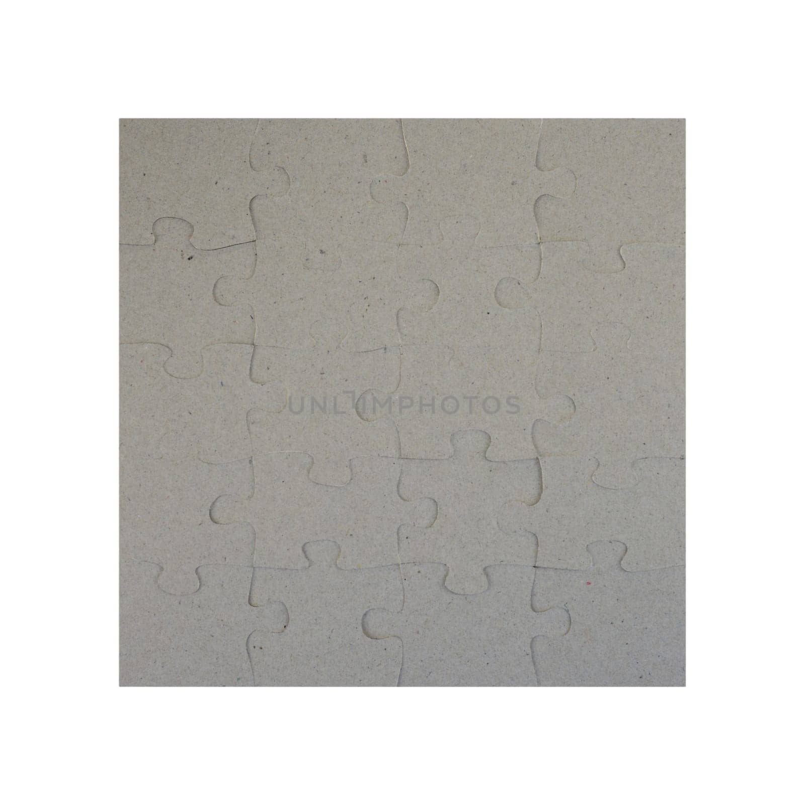 A close up shot of jigsaw pieces