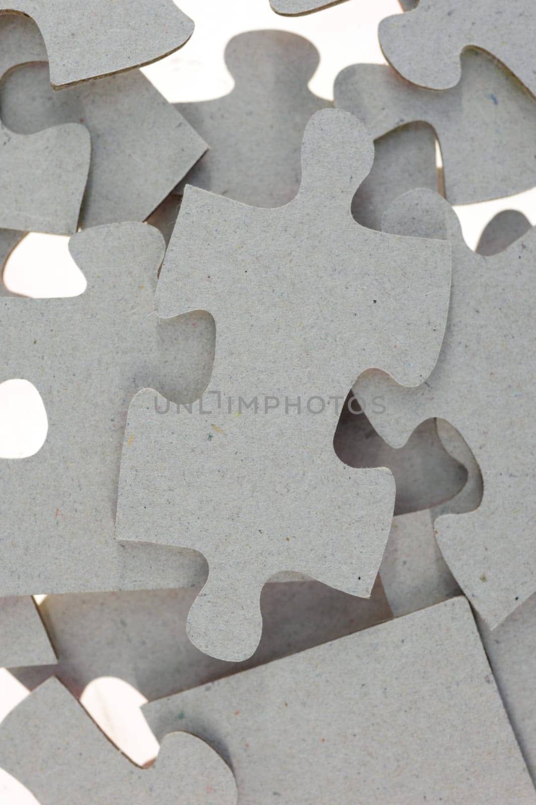 A close up shot of jigsaw pieces