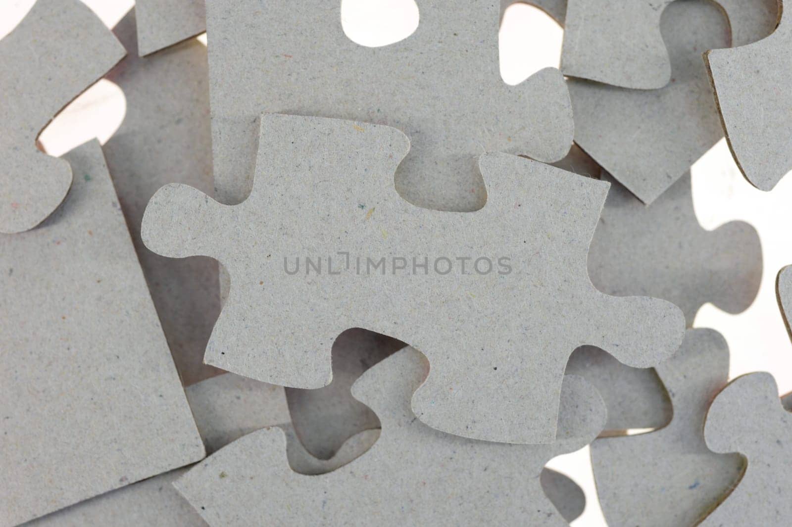 A close up shot of jigsaw pieces
