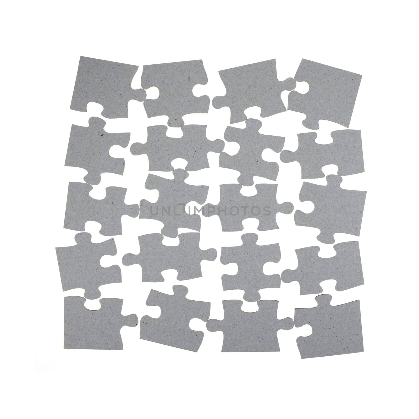 A close up shot of jigsaw pieces