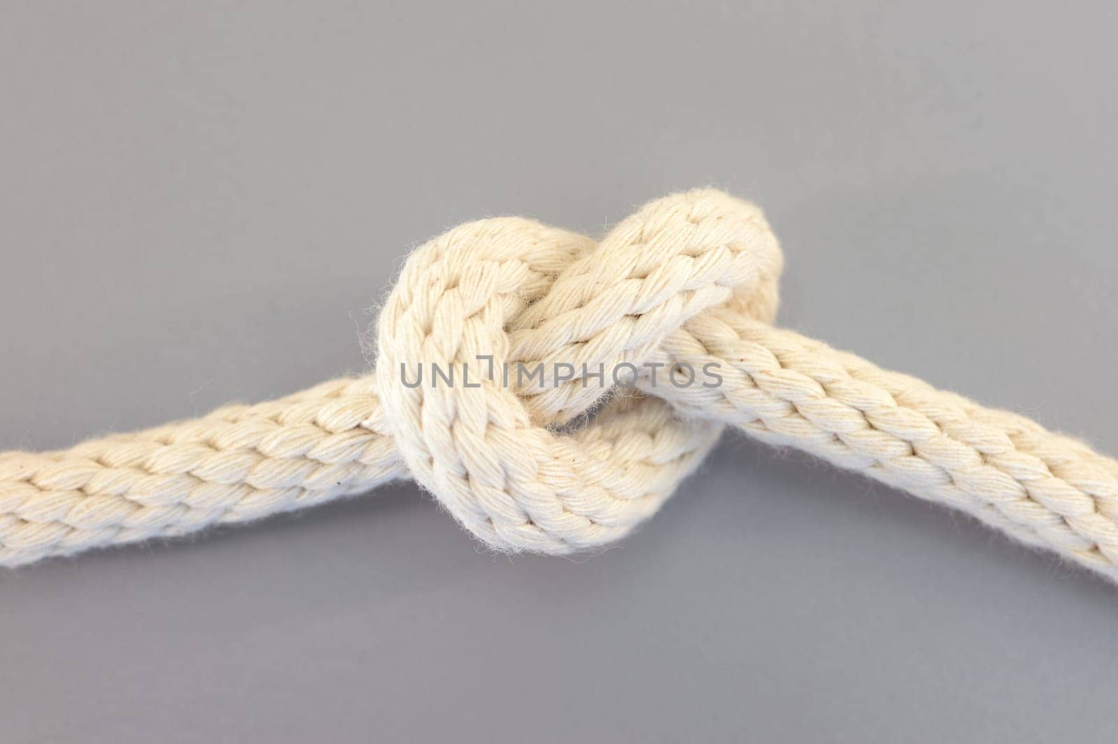 A close up shot of a white rope