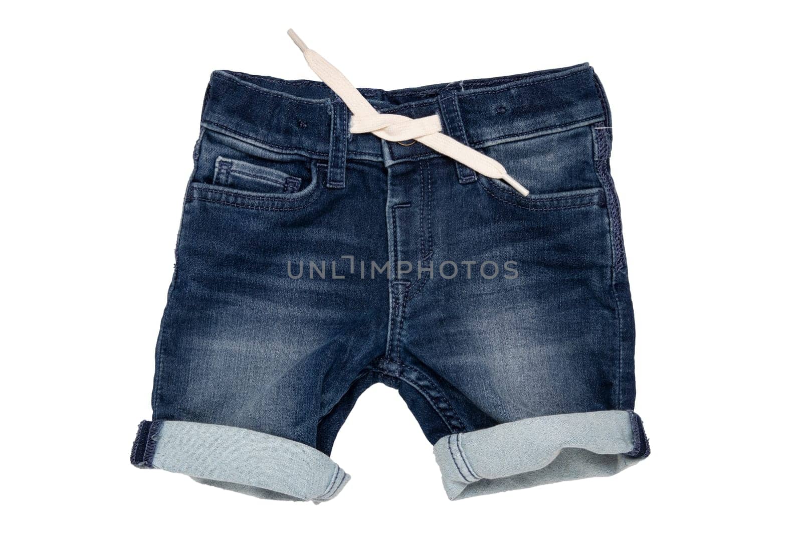 Jeans shorts isolated. Trendy stylish short jeans pants with white ribbon for child boy isolated on a white background. Fashionable denim short pants.