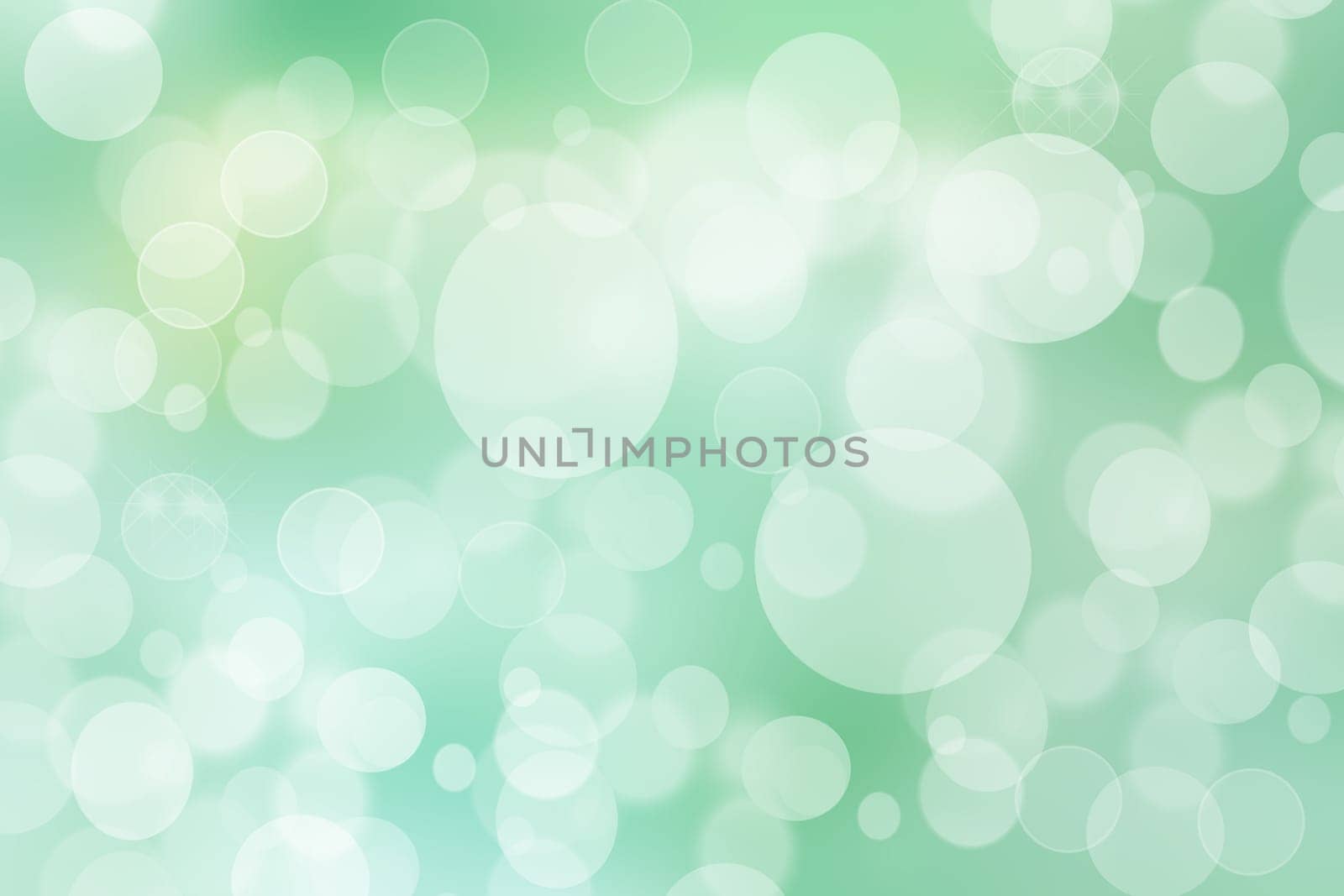 Green turquoise abstract shiny blurred background texture with circular bokeh lights. Beautiful backdrop.