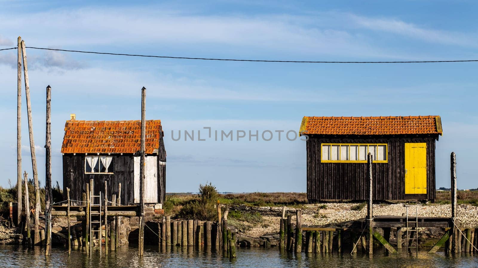 Colourful cabin of fishermen huts at La Tremblade near Oleron,Nouvelle-Aquitaine, France