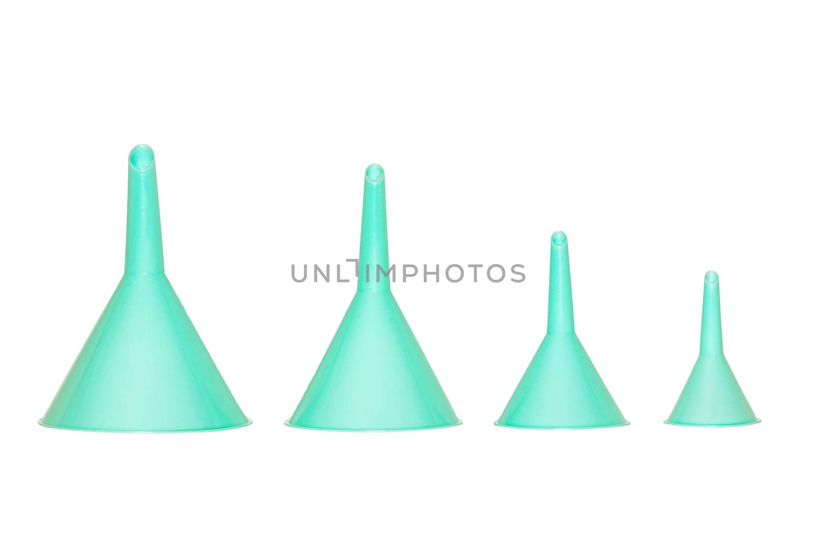 Funnel isolated. Closeup of four turquoise plastic funnels of different sizes isolated on a white background. Macro.
