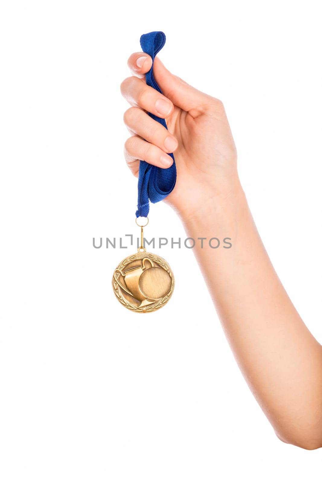 Girl hand raised holding gold medal against white background award and victory concept
