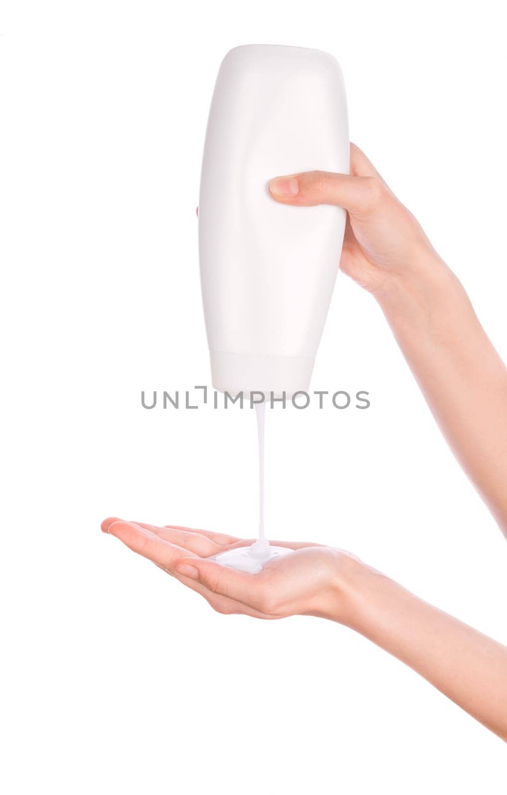 White bottle of shower gel lotion cream in hands pattern on a white background isolation
